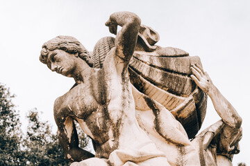Fountain with stone sculptures in the gardens of the royal palace of Caserta, Italy
