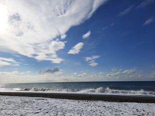 snowy beach near the sea