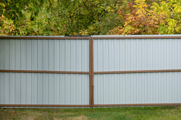 Metal gray gates in a private house