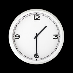 White round analog wall clock isolated on black background.