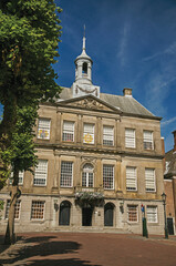 Richly decorated facade in Gothic style of the Brussels City Museum and blue sky, at Grand Place. The vibrant and friendly capital of Belgium.