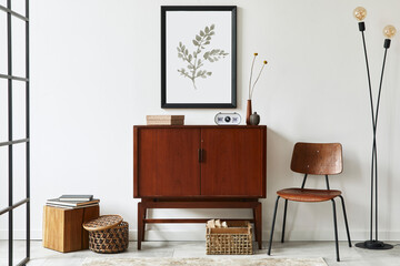 Modern retro concept of living room interior with design teak commode, black mock up poster frame,...