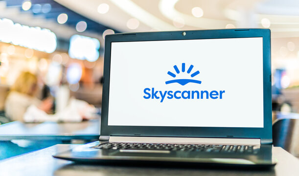 Laptop computer displaying logo of Skyscanner