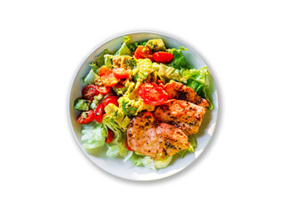 Clean food good health concept. Flat lay of roasted chicken with black pepper, green oak lettuce, avocado in white plate isolated on white background.