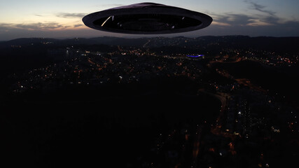 Large Alien spaceship sacuer ufo silhouette over city at sunset,
, Drone view over Jerusalem with...