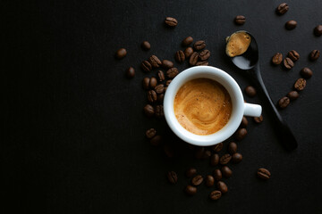 Obraz na płótnie Canvas Espresso served in cup on dark