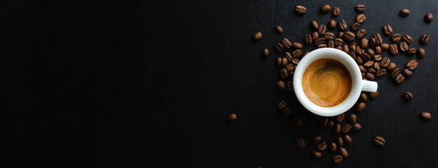 Espresso served in cup on dark - obrazy, fototapety, plakaty