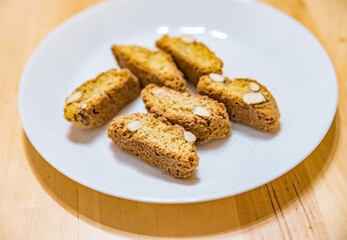 Biscotti cantuccini, Italian almond biscuits on a white plate