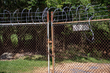 Wire Mesh Fence Panels for Security on private property background.