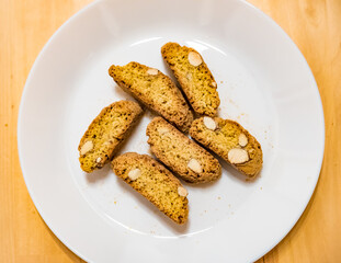 Biscotti cantuccini, Italian almond biscuits on a white plate