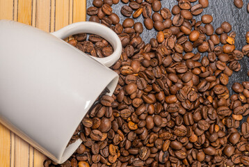 coffee mug and grains beans seed roasted