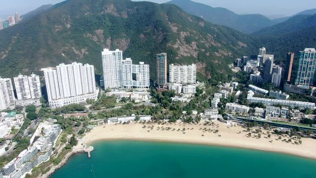 Hong Kong Repulse Bay skyline with luxury residential complexes on a beautiful clear day, Aerial view.