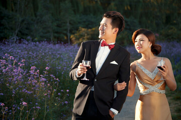 Wearing evening dress fashion of young man and woman in the private estate