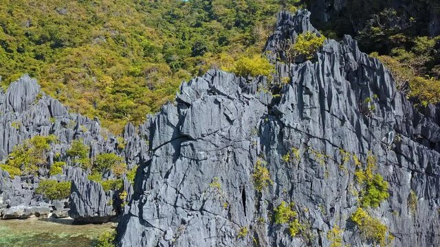 Beautiful rock mountain slopes of Sagada, Philippines -aerial ascend
