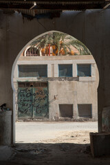 An archway looking out over a street scene in Ghadema, the medina or old city of Tripoli, Libya.