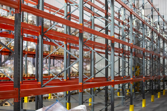 Metal structure of warehouse shelves for storing products.