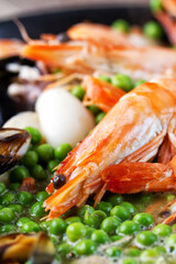 Pan-fried Seafood with Peas. High quality photo.