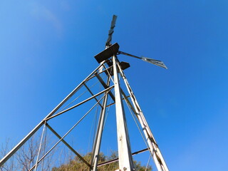 Fototapeta na wymiar The Windmill and Wind
