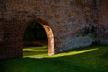 Arch in the gothic brick wall of the Olsztyn castle