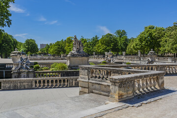 Obraz premium Remarkable garden and first public garden in Europe: Nimes Gardens of the Fountain (Jardin de la Fontaine, 1738 - 1755). Nimes, Occitanie region of southern France.