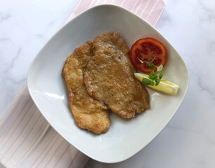 Turkey Escalope, also known als natural schnitzel with gravy and fresh lemon.