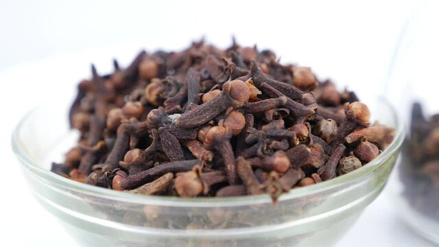 Rotating shot of bowl filled with cloves, Bowl filled with Laung( cloves )