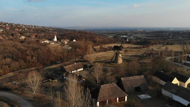 Aerial View Of A Small Village with a Windmill in HUNGARIAN OPEN AIR MUSEUM