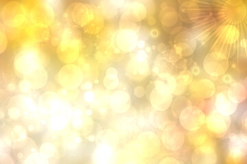 A festive abstract Happy New Year or Christmas texture background and with golden yellow blurred bokeh lights and stars. Space for design. Card concept or advertising.