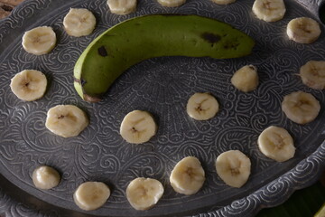 green banana pieces on the table