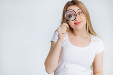 woman, magnifying, eye, glass, looking, holding, young, curious,