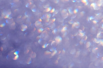 Bokeh background. Glowing circles on defocused light abstract background.  