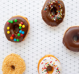 flat lay assorted donuts