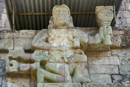Copan, Honduras, Central America: One of two simian sculptures on Temple 11, possibly representing howler monkey gods. Copan is an archaeological site in Honduras. 