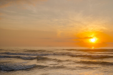 Naklejka na ściany i meble silhouette beach with sunrise and sea background