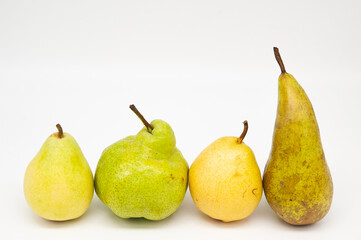 four pears on a white background
