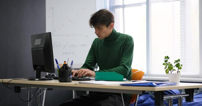  Businessman in a hurry to complete work at the computer