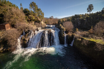 Poço da Broca Waterfall in Serra da Estrela Natural Park , Portugal