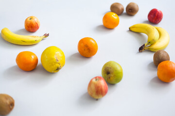 Fresh natural fruits of different kinds on a white background photography fitness food health vegan slimming diet nutrition influenzer lifestyle
