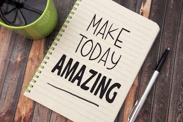 Make today amazing, text words typography written on book against wooden background, life and business motivational inspirational
