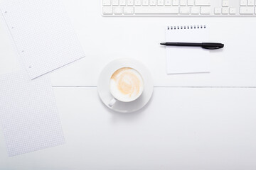 office desk, cappuccino latte , keypad, reminder, directly above