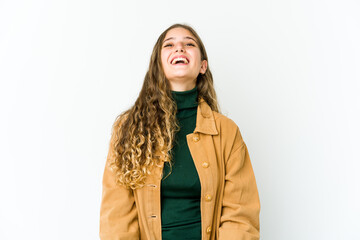 Young caucasian woman relaxed and happy laughing, neck stretched showing teeth.