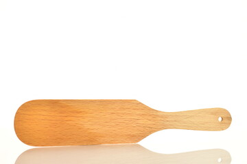 One wooden spatula, for the kitchen, close-up, isolated on white.