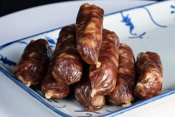 Chinese Sausage on a Blue and White Ceramic Plate
