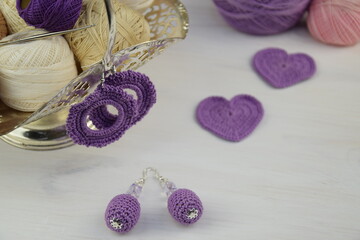Crochet violet earrings nad hearts, crechet jewellery hand made,, women's hobby, crocheting, hook, cotton, chenille, cord, white wooden background