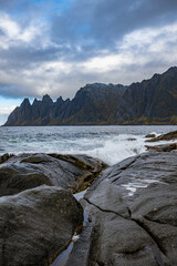 Mountains of Senja surrounded by water in north Norway