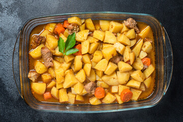 goulash meat with potatoes stewed vegetables and pork on the table for healthy meal snack outdoor top view copy space for text food background rustic image