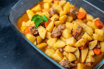 goulash meat with potatoes stewed vegetables and pork on the table for healthy meal snack outdoor top view copy space for text food background rustic image