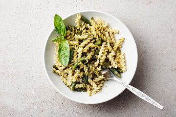 Fusilli pesto pasta with green beans.
