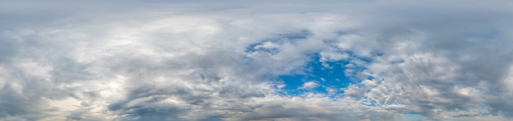 Blue sky with Cumulus clouds Seamless panorama in spherical equirectangular format. Complete zenith...