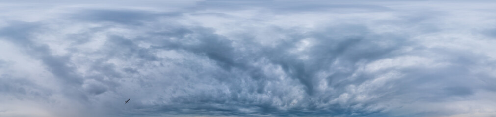 Sky panorama on overcast rainy day with low clouds in seamless spherical equirectangular format....